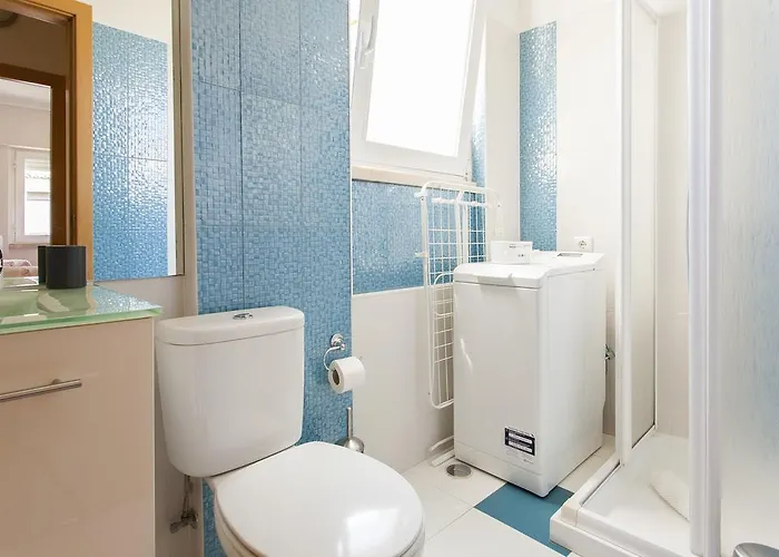 Apartment Joivy Bright 2br Apt With River Views &balcony In Alfama, Moments From Santa Apolonia Train Station Lisbon